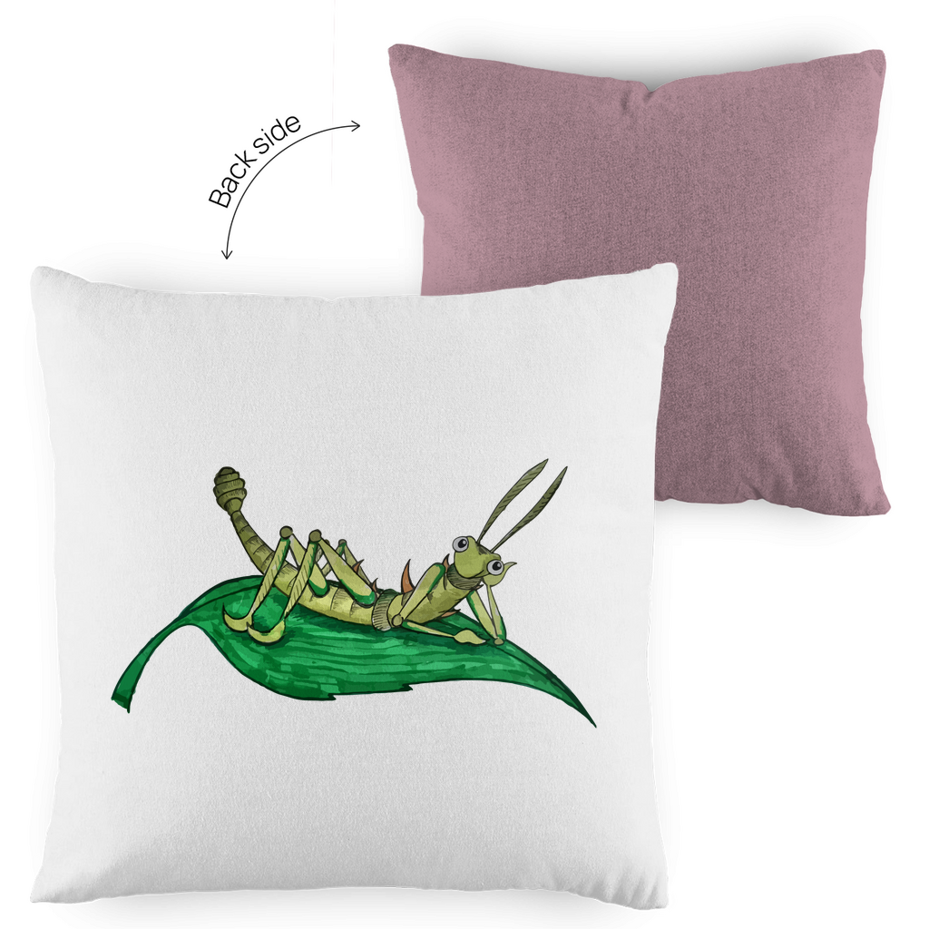 Kopfkissen zweifarbig Krabbelcrew Dornschrecke Kasimir liegt auf einem Blatt